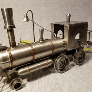 Train hand made and welded from scrap metal